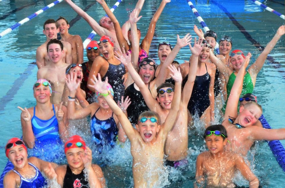 swim team having fun in the pool